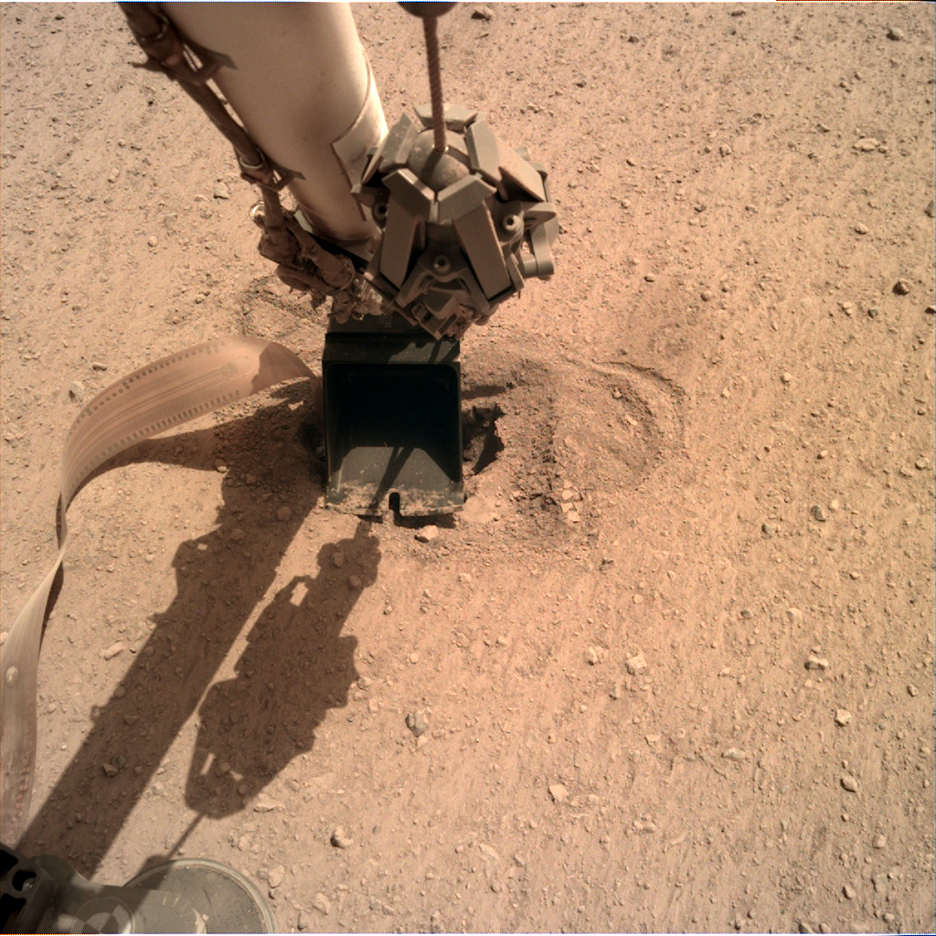 Science Tips  Tips  Tricks   Technology The ‘mole’ on Mars is finally underground after a push from NASA’s InSight lander